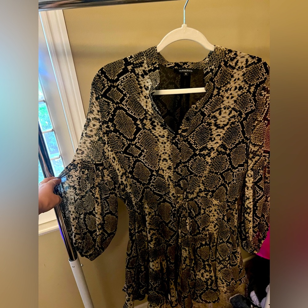 Snake print mini dress. Long sleeve.  Worn once to an event. Size medium!
